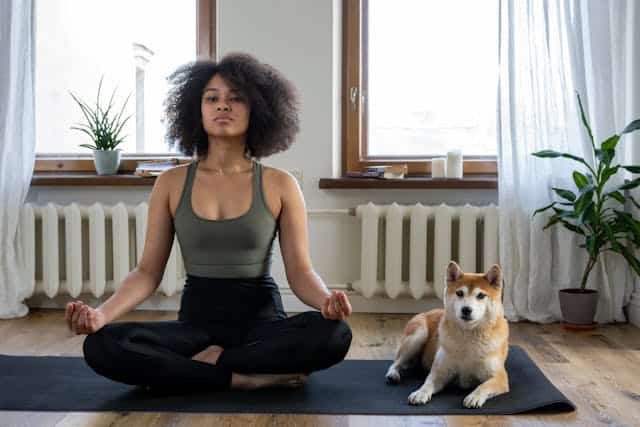 Adhd woman meditating with dog calm focus relaxation