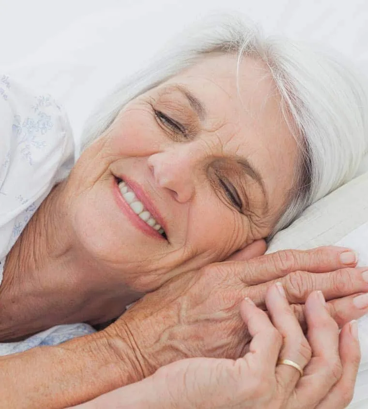 Chronic pain old lady on bed