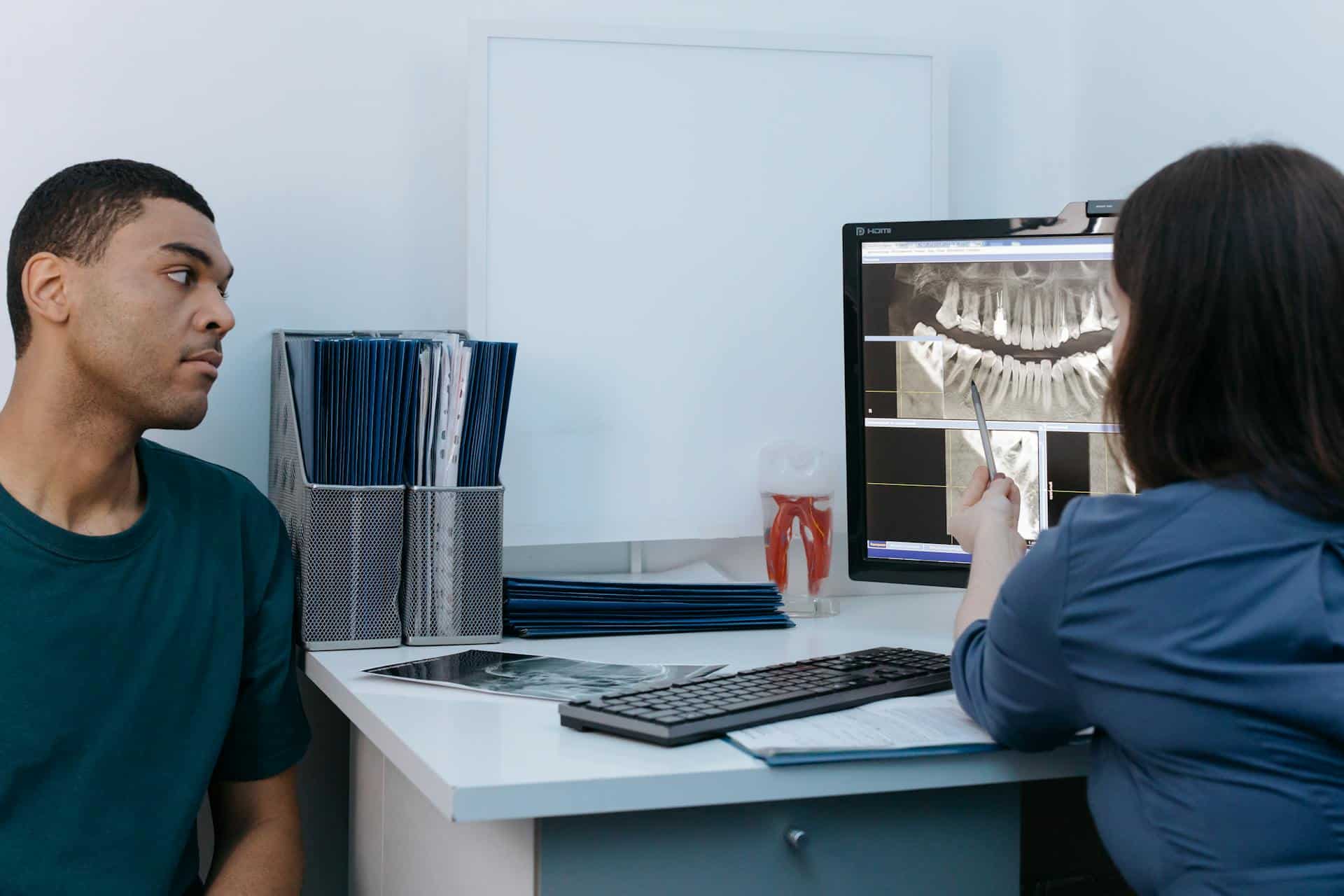 Dentist explaining tmj xray